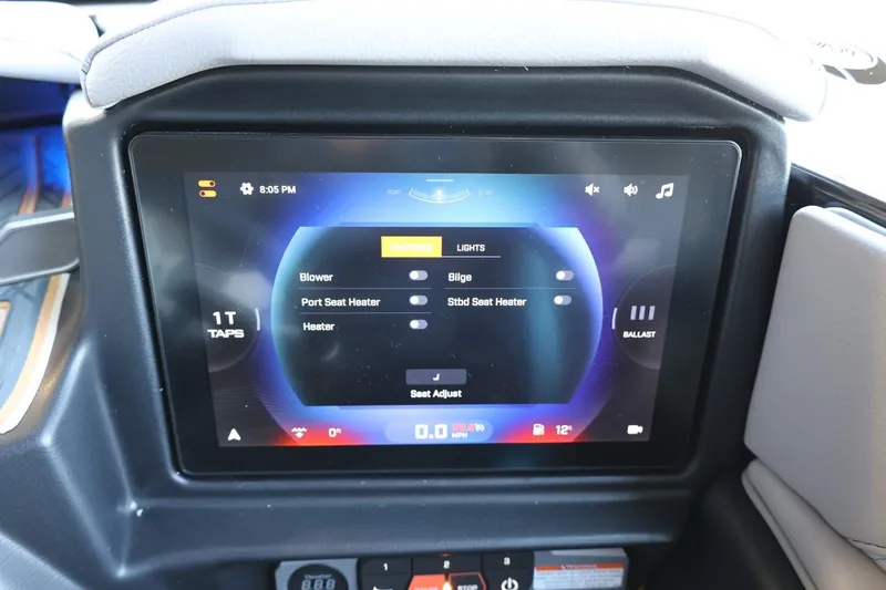 Slide: The Image of Touchscreen control panel in 2025 Tigé 24RZX boat, displaying seat and heater settings. - 38
