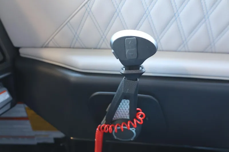 Slide: The Image of Interior detail of 2025 Tigé 24RZX boat with safety lanyard and quilted upholstery. - 42