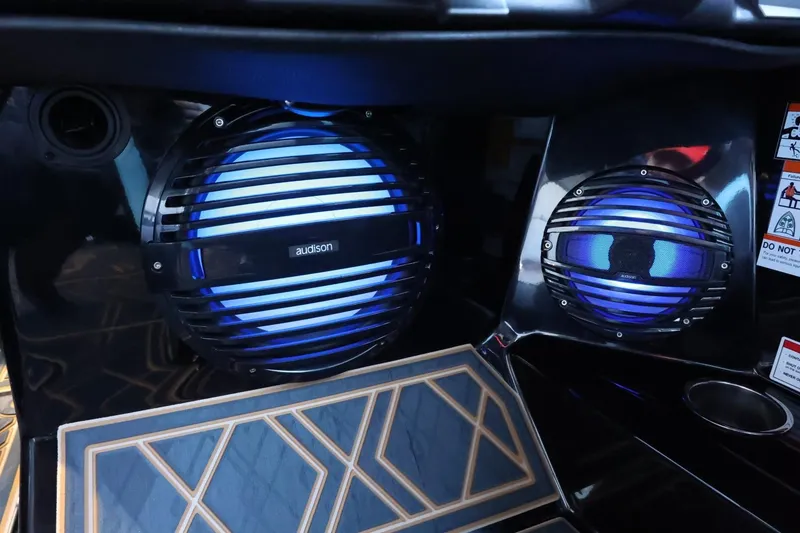 Slide: The Image of 2025 Tigé 24RZX boat interior with illuminated audio speakers and stylish flooring design. - 47