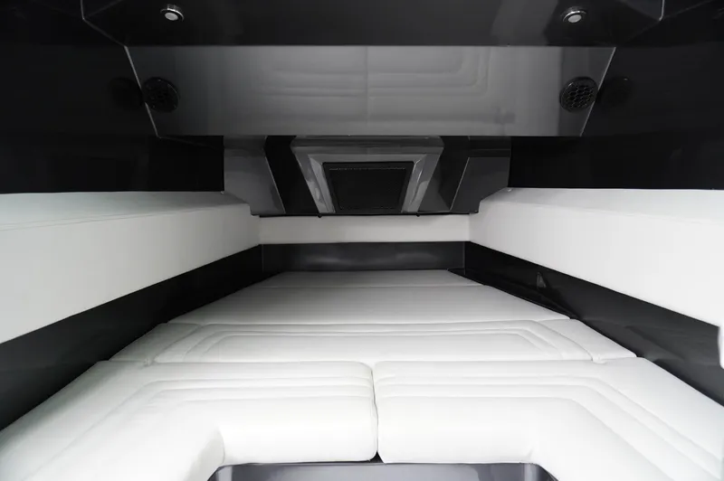 Slide: The Image of Luxurious interior of 2024 Adrenaline 47 Reaper boat with sleek white seating. - 13
