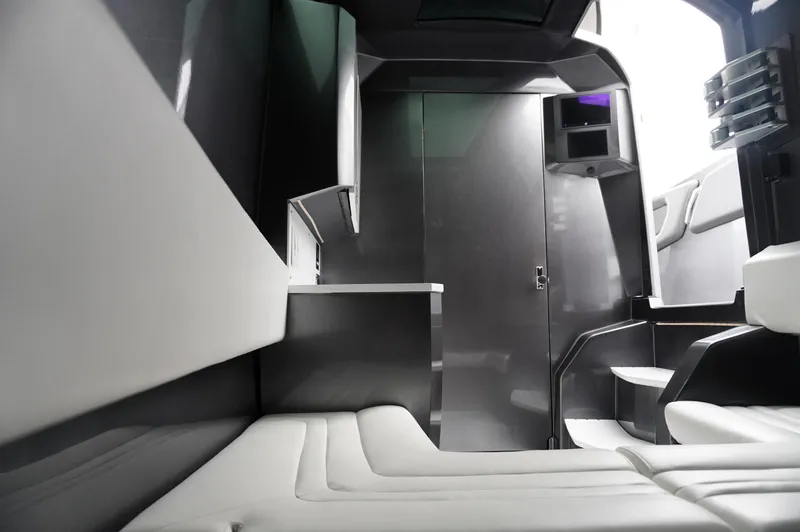 Slide: The Image of 2024 Adrenaline 47 Reaper interior, sleek modern design with white and gray accents. - 14