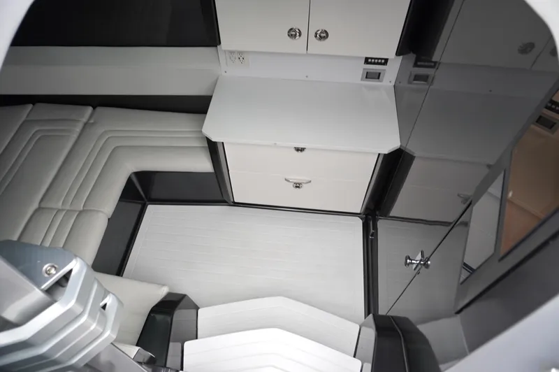 Slide: The Image of 2024 Adrenaline 47 Reaper interior with modern seating and cabinetry. - 15