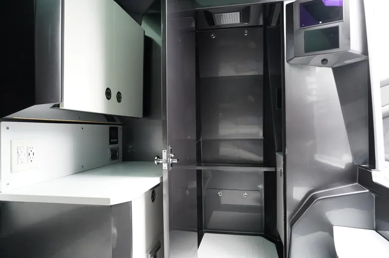 Slide: The Image of 2024 Adrenaline 47 Reaper interior with sleek cabinets and modern design. - 19