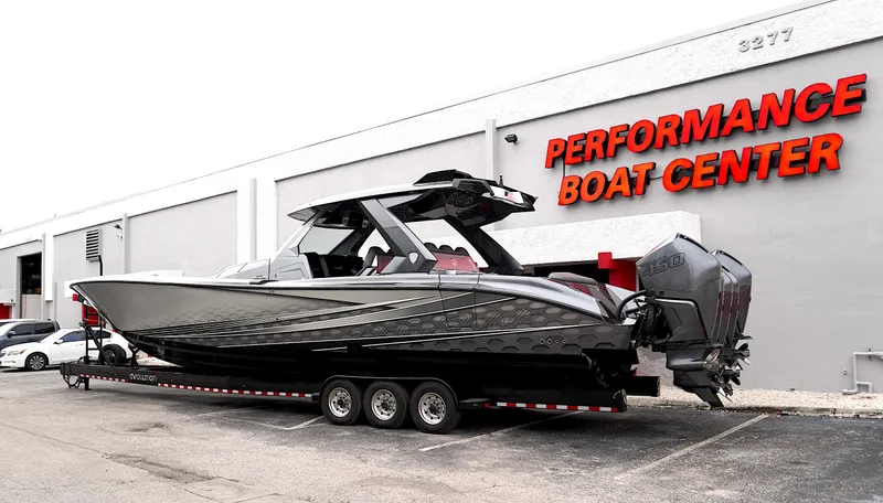 Slide: The Image of 2024 Adrenaline 47 Reaper boat at Performance Boat Center. - 2