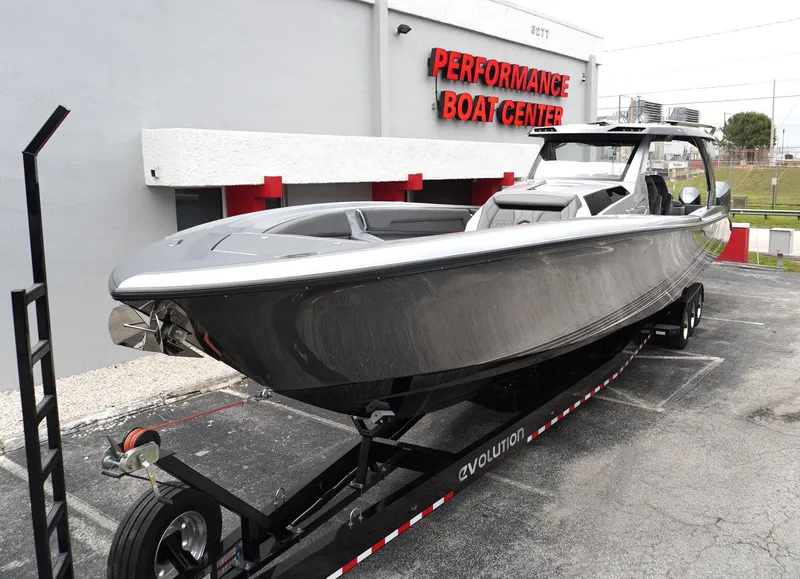 Slide: The Image of 2024 Adrenaline 47 Reaper boat on trailer at Performance Boat Center. - 3