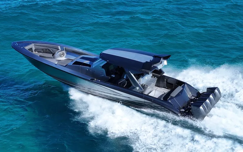 Slide: The Image of 2024 Adrenaline 47 Reaper speedboat cruising on vibrant blue ocean waters. - 34