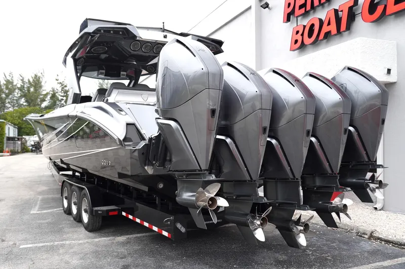 Slide: The Image of 2024 Adrenaline 47 Reaper boat with four powerful engines on a trailer. - 4