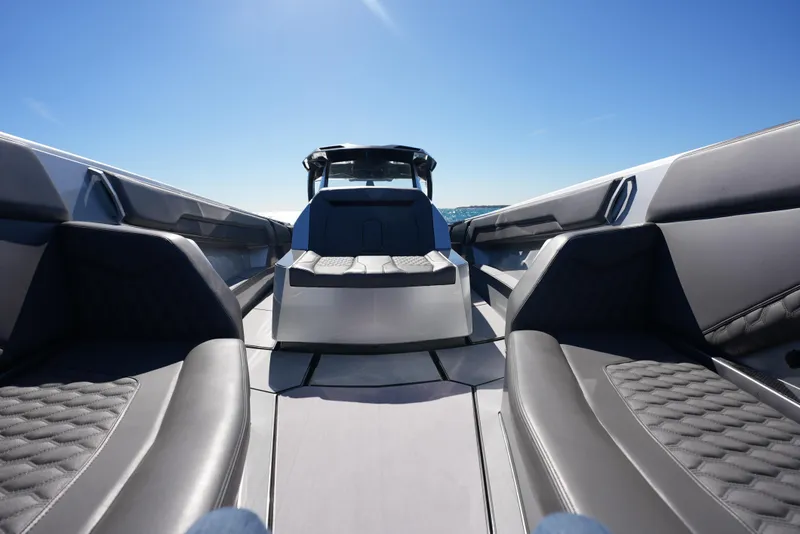 Slide: The Image of 2024 Adrenaline 47 Reaper boat interior with sleek seating and modern design. - 42