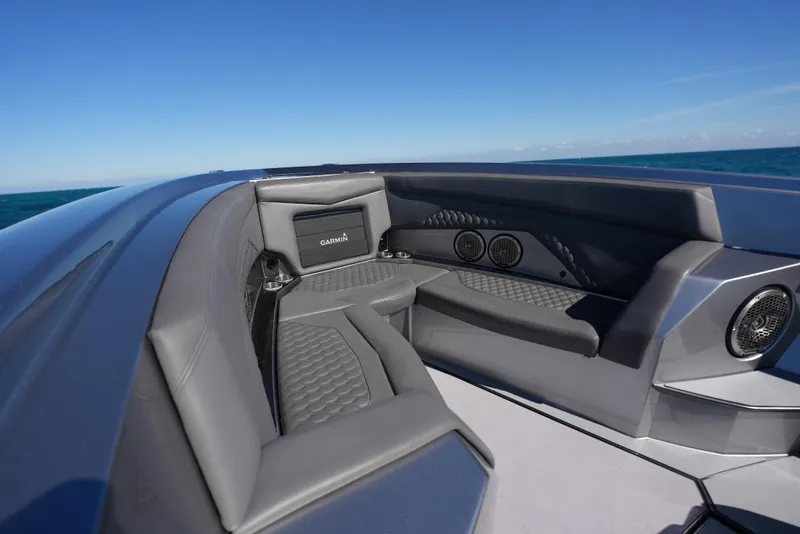 Slide: The Image of 2024 Adrenaline 47 Reaper boat interior with sleek seating and modern design. - 43
