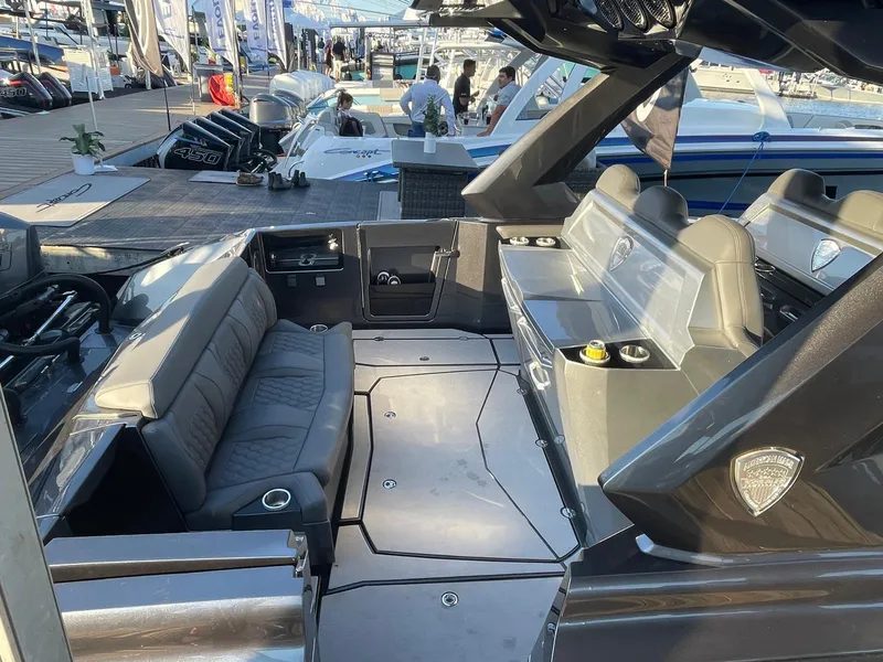 Slide: The Image of 2024 Adrenaline 47 Reaper boat interior with sleek seating and modern design. - 46