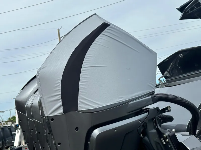 Slide: The Image of 2024 Adrenaline 47 Reaper engine cover, sleek design, outdoor setting. - 48