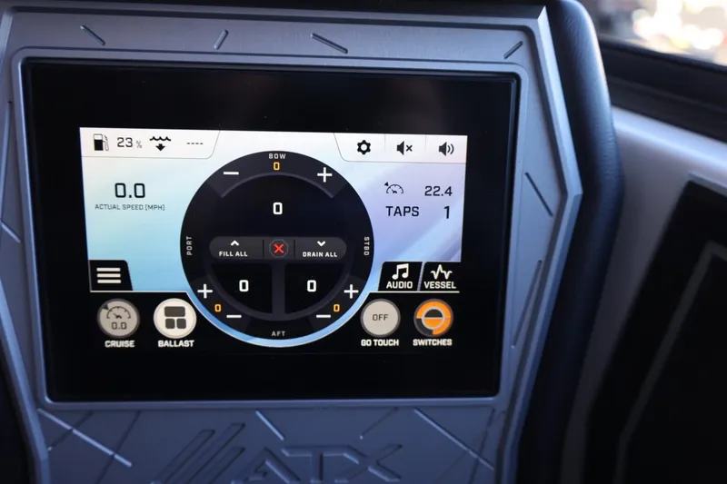Slide: The Image of ATX Surf Boats 2025 24 Type-S touchscreen display showing controls and settings. - 20