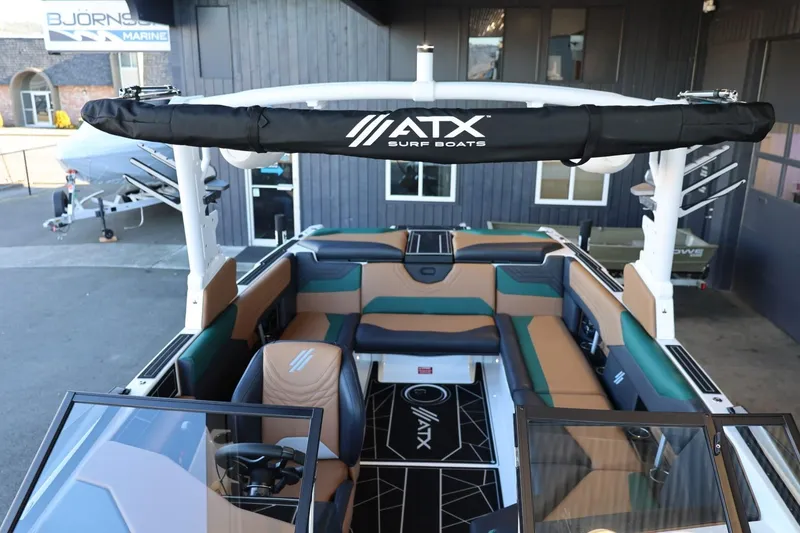 Slide: The Image of 2025 ATX Surf Boats 24 Type-S interior with modern seating and sleek design. - 24