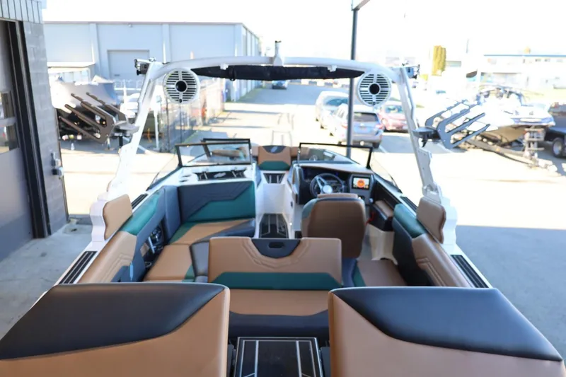Slide: The Image of 2025 ATX Surf Boats 24 Type-S interior, featuring modern seating and advanced dashboard controls. - 30
