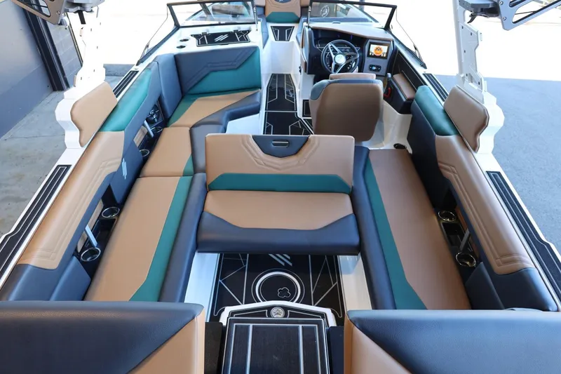 Slide: The Image of 2025 ATX Surf Boats 24 Type-S interior with modern seating and dashboard design. - 33