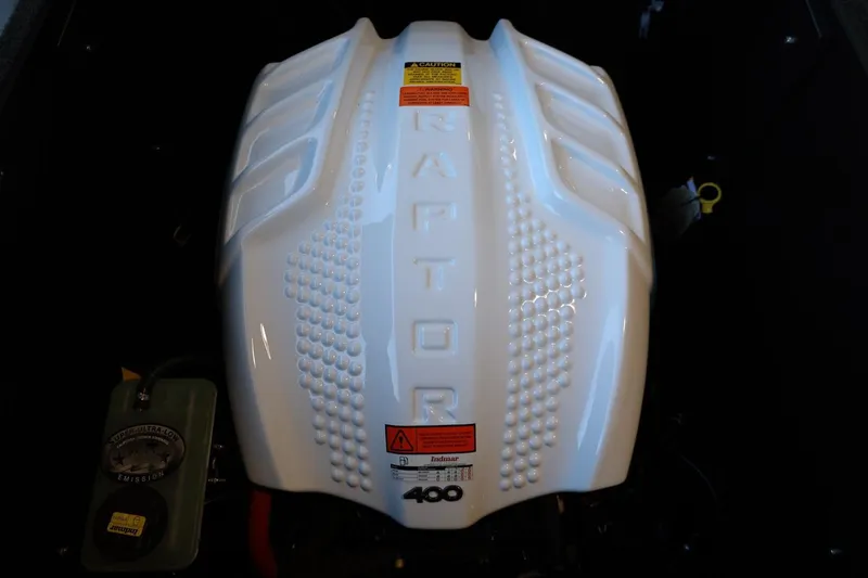 Slide: The Image of 2025 ATX Surf Boats 24 Type-S engine, featuring a Raptor 400 cover. - 37
