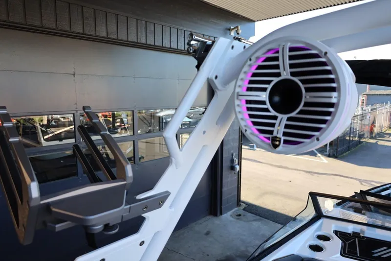 Slide: The Image of 2025 ATX Surf Boats 24 Type-S with speaker and wakeboard rack detail. - 38
