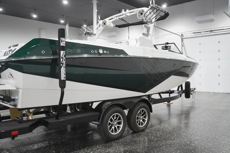 Slide: The Image of 2025 ATX Surf Boats 24 Type-S in showroom, featuring sleek design and modern features. - 44