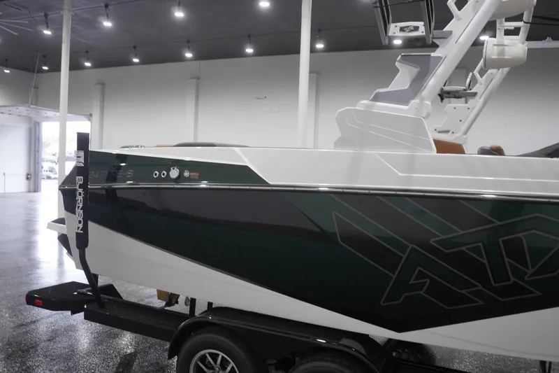 Slide: The Image of 2025 ATX Surf Boats 24 Type-S in showroom, featuring sleek design and modern detailing. - 46
