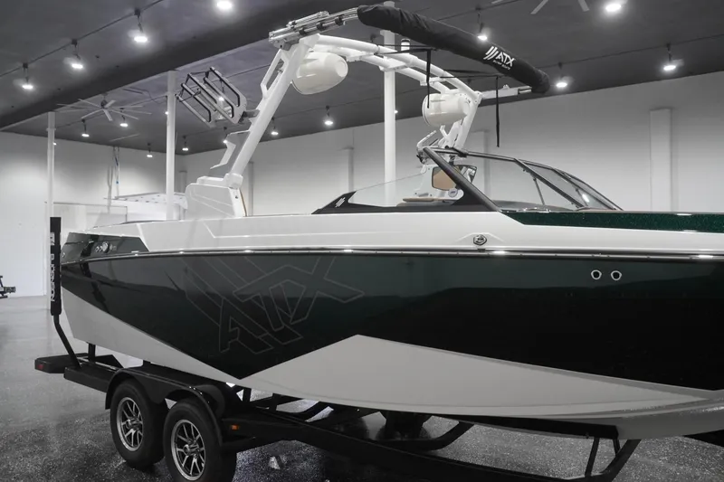 Slide: The Image of 2025 ATX Surf Boats 24 Type-S in showroom, featuring sleek design and modern features. - 49