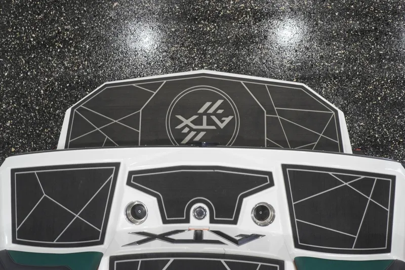 Slide: The Image of 2025 ATX Surf Boats 24 Type-S swim platform with geometric design on textured surface. - 59