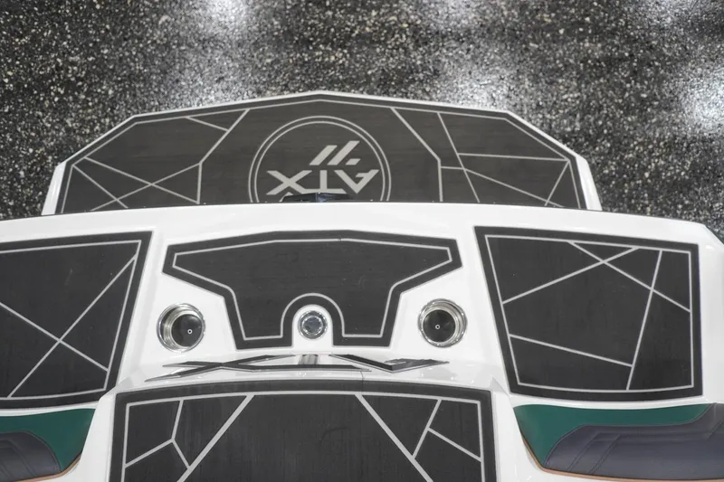 Slide: The Image of 2025 ATX Surf Boats 24 Type-S swim platform with geometric design and logo. - 62