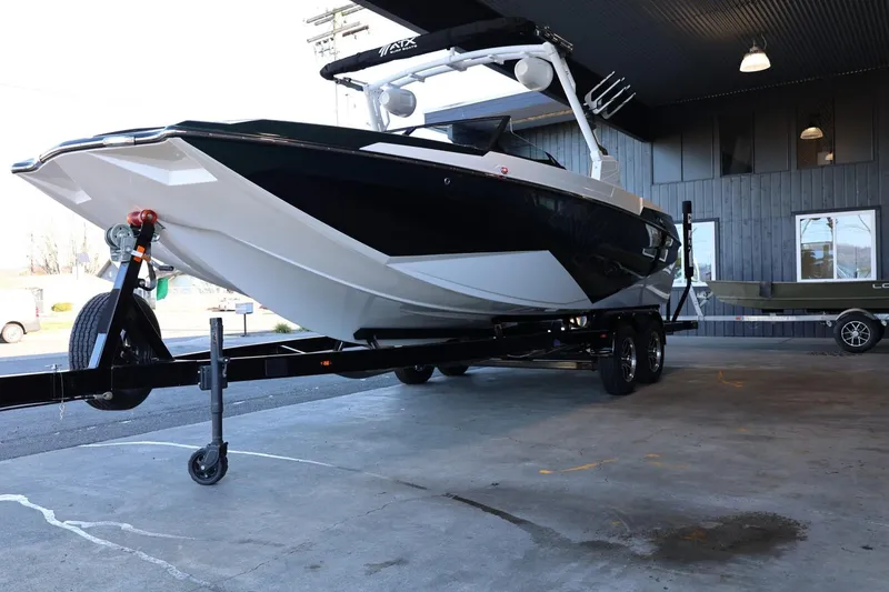 Slide: The Image of 2025 ATX Surf Boats 24 Type-S on trailer in showroom. - 7