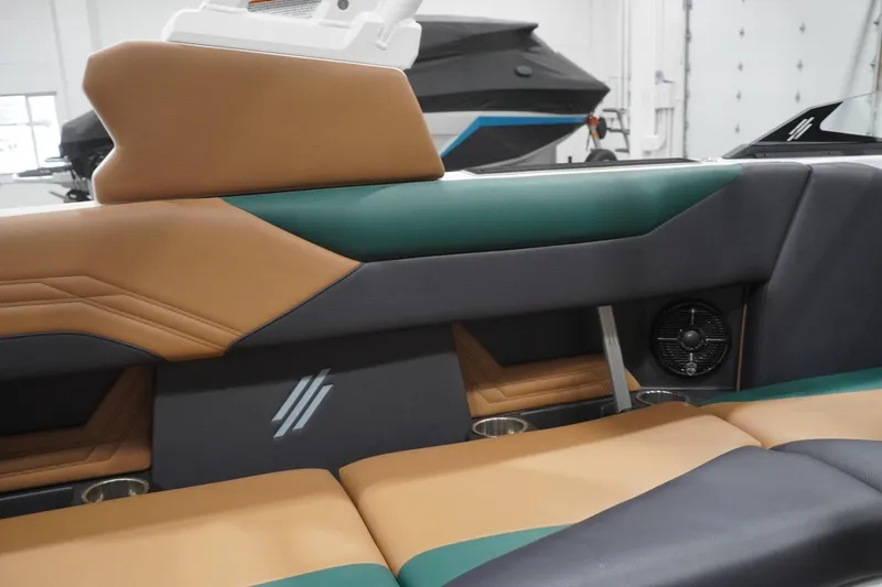 Slide: The Image of Interior of 2025 ATX Surf Boats 24 Type-S, featuring stylish seating and speaker system. - 76