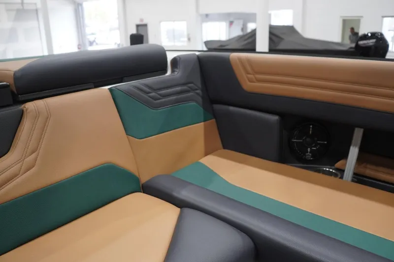 Slide: The Image of Interior of 2025 ATX Surf Boats 24 Type-S with tan and green upholstery. - 78