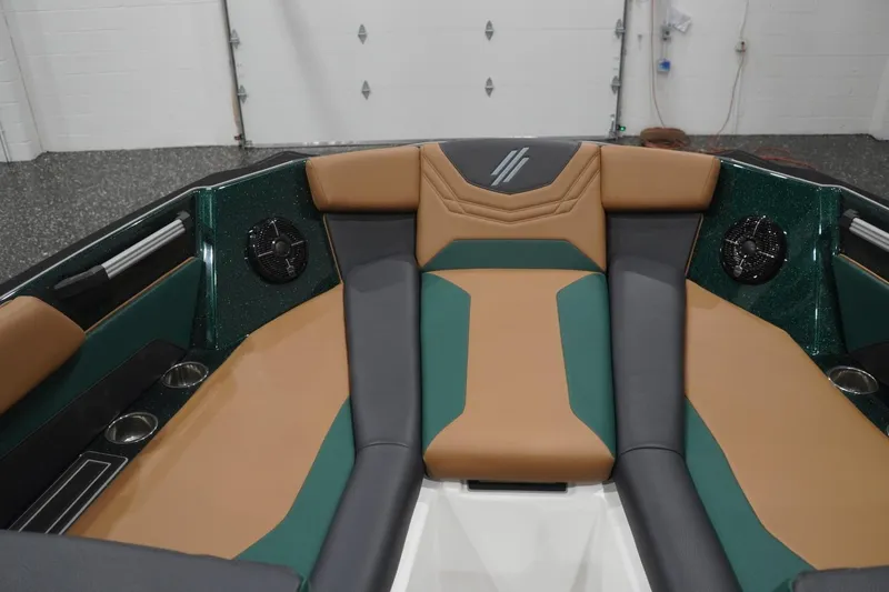 Slide: The Image of Interior view of 2025 ATX Surf Boats 24 Type-S, featuring stylish seating and speakers. - 80