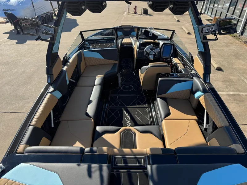 Slide: The Image of 2023 Tigé Z3 boat interior with stylish seating and modern dashboard. - 6