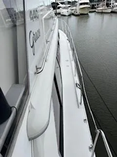 Slide: The Image of 1995 Carver 440 Aft Cabin Motor Yacht docked at marina. - 8