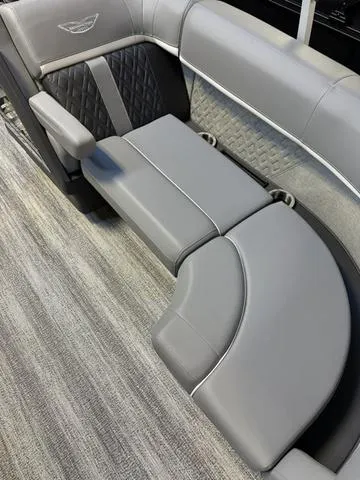 Slide: The Image of 2025 Bennington M Swingback 22 MSB boat seating, featuring luxurious gray upholstery and modern design. - 3