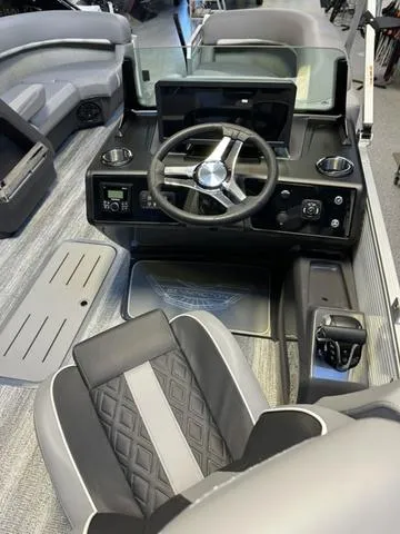 Slide: The Image of Interior of 2025 Bennington M Swingback 22 MSB boat with modern steering console. - 4