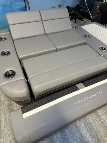 Slide: The Image of 2025 Bennington M Swingback 22 MSB boat seating with cup holders, gray upholstery. - 5