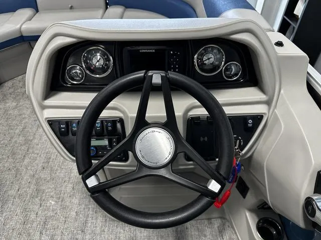 Slide: The Image of Steering wheel and dashboard of 2024 South Bay 222RS LE 2.75 boat. - 7
