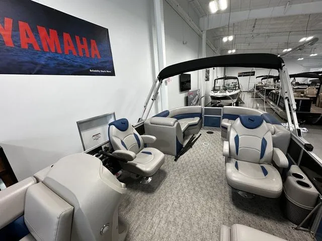Slide: The Image of 2024 South Bay 222RS LE 2.75 pontoon boat interior with seating and Yamaha signage. - 9