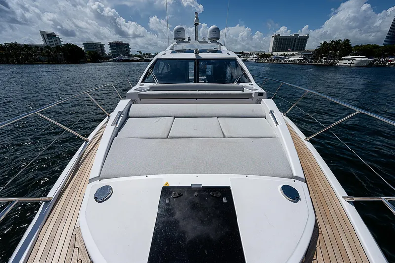 Slide: The Image of 2022 Azimut S6 yacht on water, showcasing sleek design and luxurious deck. - 15