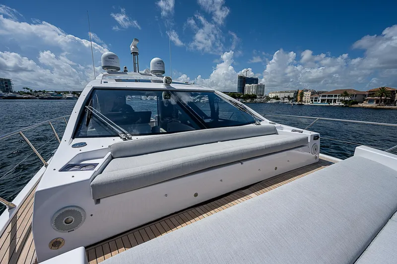 Slide: The Image of Azimut S6 2022 yacht on water, showcasing sleek design and luxurious deck seating. - 17