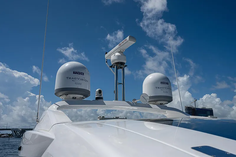 Slide: The Image of 2022 Azimut S6 yacht with radar and satellite domes against a blue sky. - 20