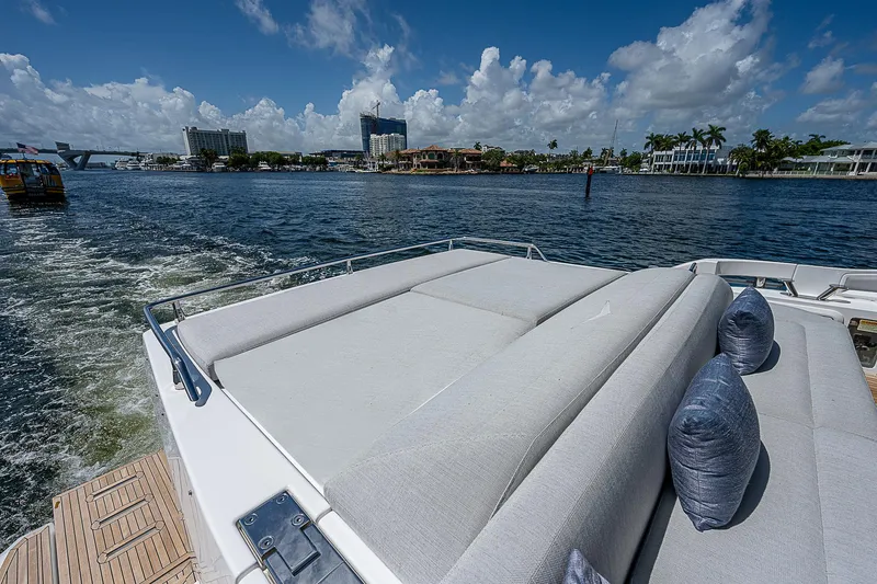 Slide: The Image of 2022 Azimut S6 yacht with sunbed, cruising on a sunny day. - 21