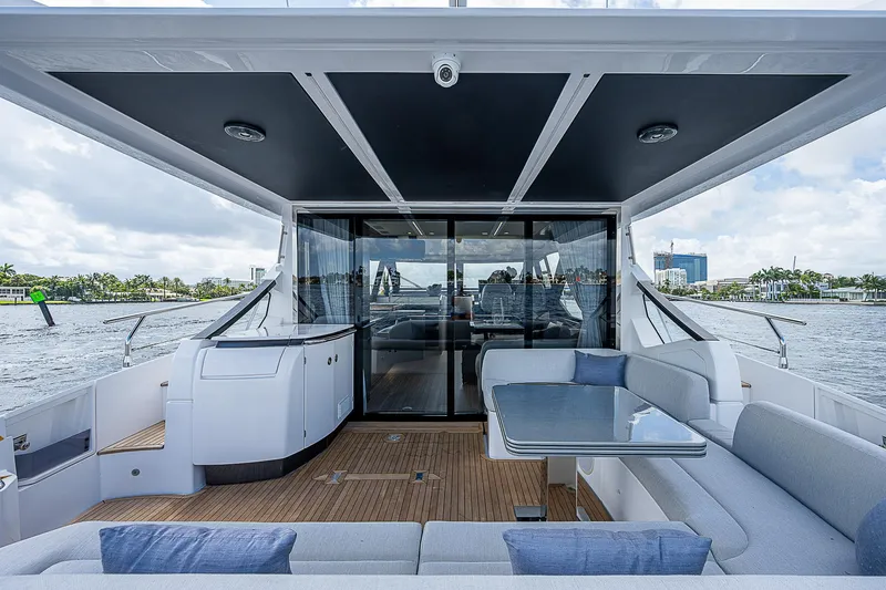 Slide: The Image of 2022 Azimut S6 yacht with sleek deck design and luxurious seating area. - 33