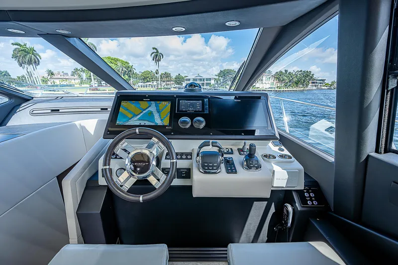 Slide: The Image of Cockpit of 2022 Azimut S6 yacht with modern navigation system and steering wheel. - 38