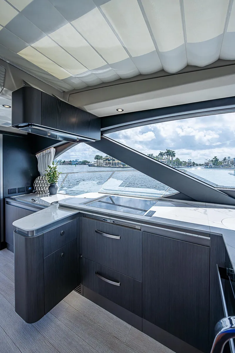 Slide: The Image of Luxurious interior of 2022 Azimut S6 yacht with modern kitchen and scenic ocean view. - 42