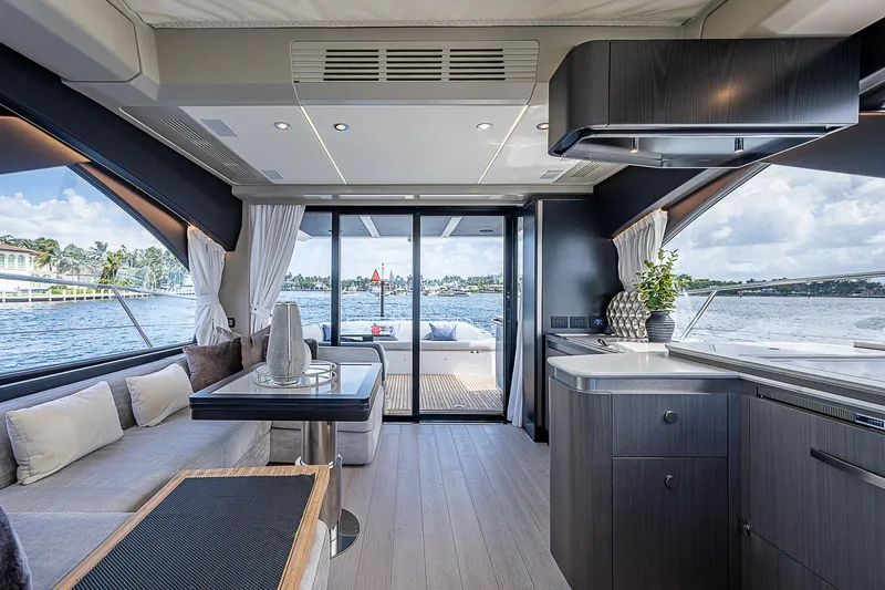 Slide: The Image of Luxurious interior of 2022 Azimut S6 yacht with modern kitchen and scenic water views. - 44