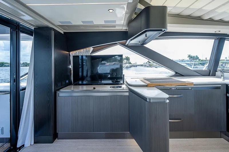 Slide: The Image of Luxurious interior of 2022 Azimut S6 yacht with modern kitchen and large windows. - 45