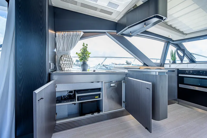 Slide: The Image of Luxurious interior of 2022 Azimut S6 yacht with modern kitchen design. - 46