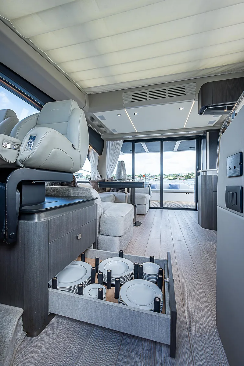 Slide: The Image of Luxurious interior of 2022 Azimut S6 yacht with modern seating and storage. - 49