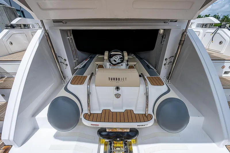 Slide: The Image of 2022 Azimut S6 yacht with Turbojet tender in storage compartment. - 9