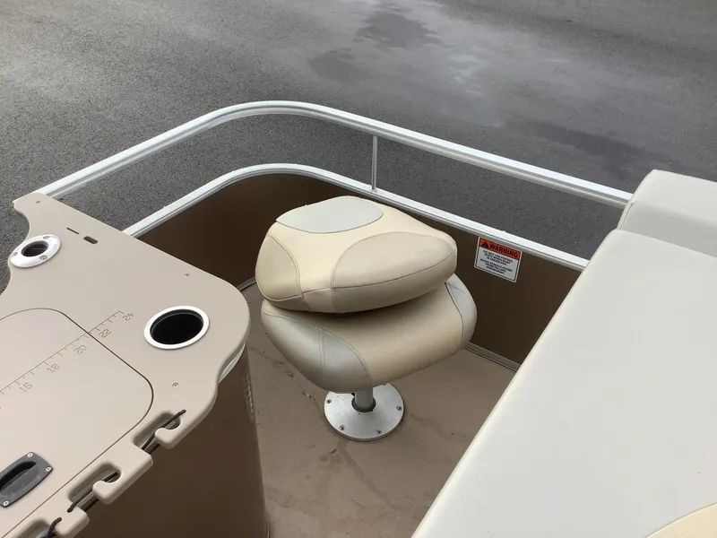 Slide: The Image of 2013 Bennington 2275 boat seat and console with cup holder. - 15